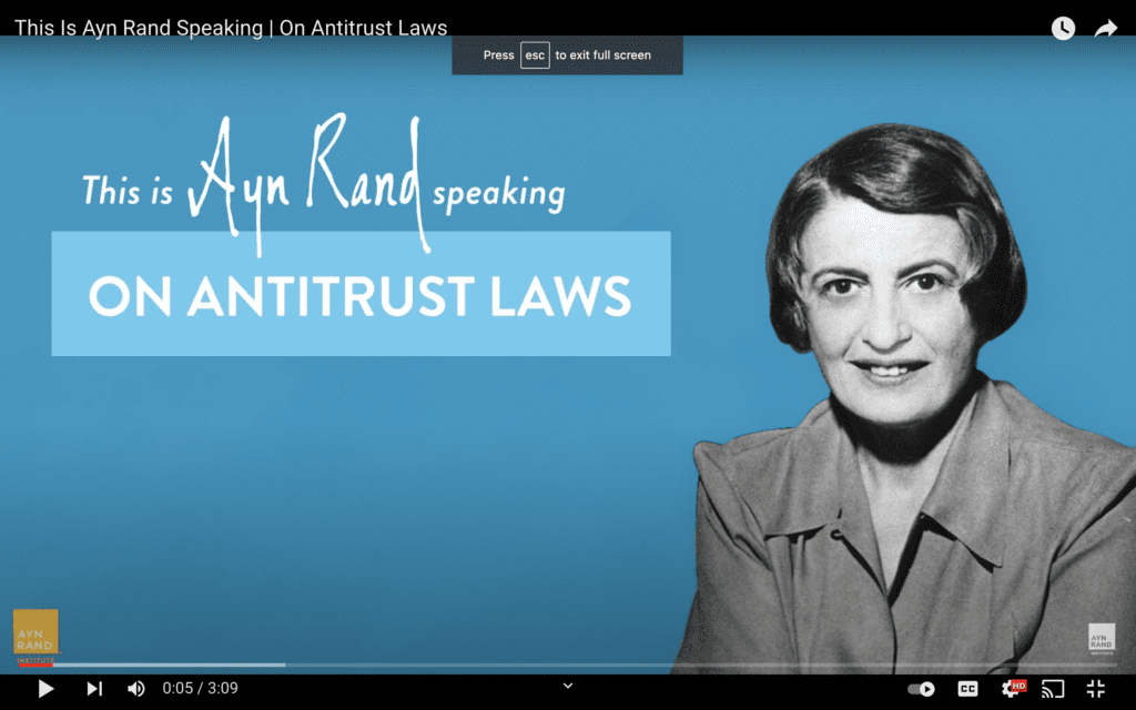 A woman is speaking about antitrust laws.