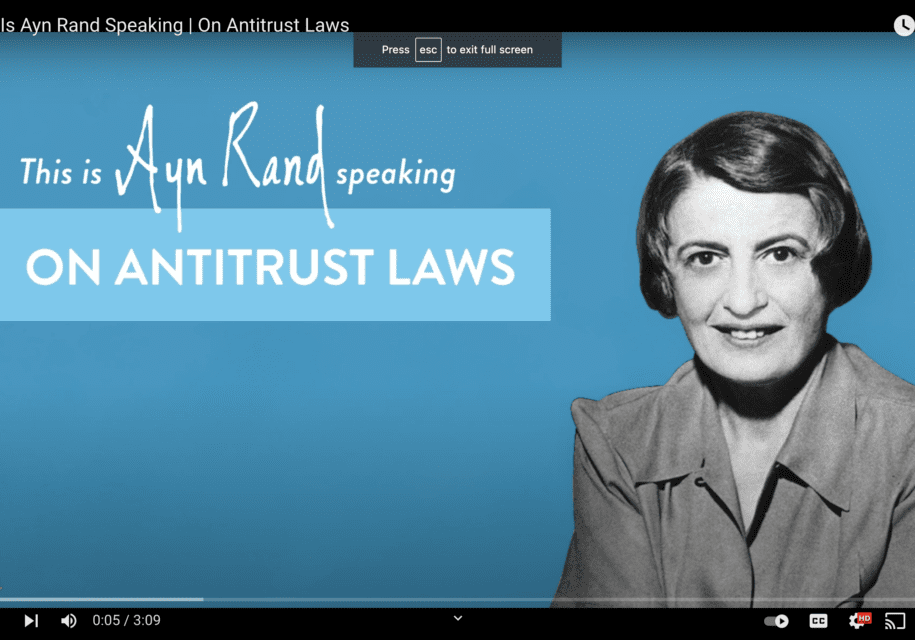 A woman is speaking about antitrust laws.